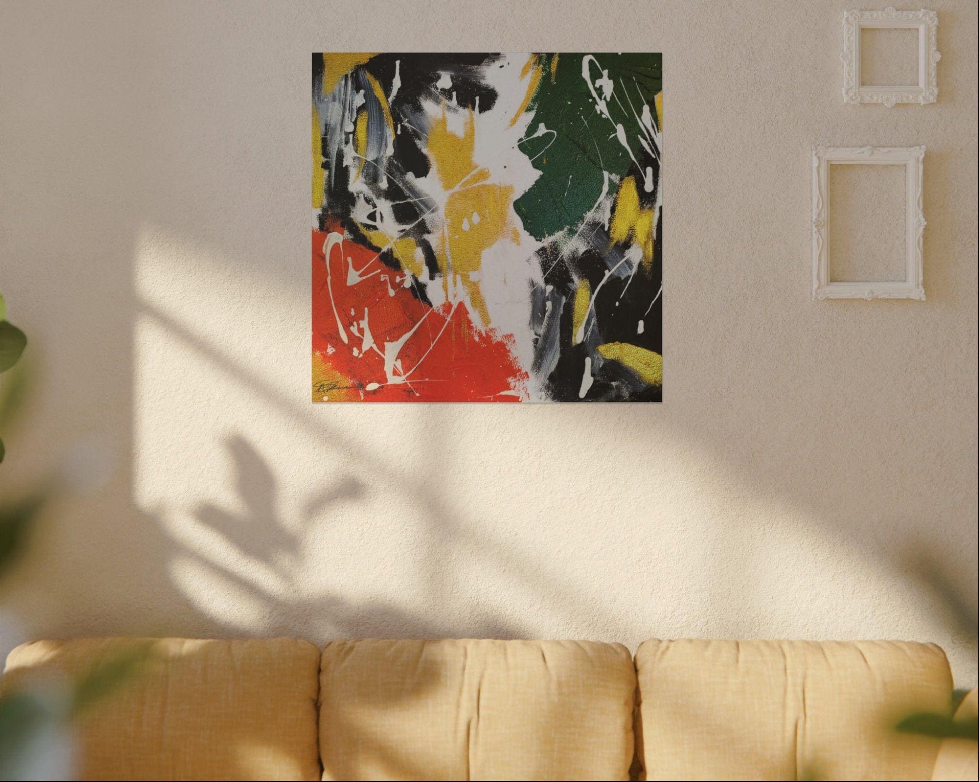 Abstract painting on a wall above a sofa with sunlight 